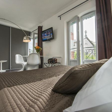 Hotel Des Capucins Le Puy-en-Velay Kamer foto